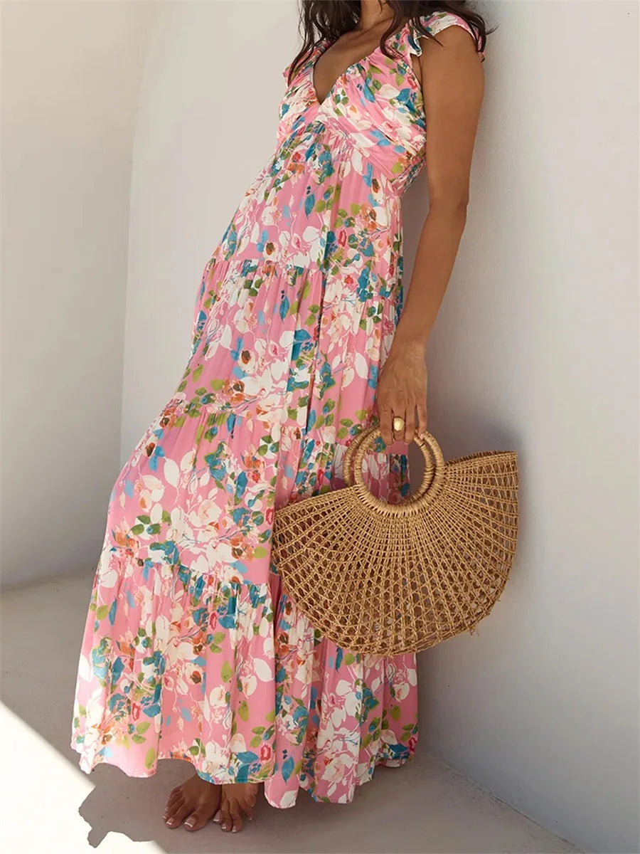 Elegant Sleeveless Maxi Dress with Boho Floral Print and Ruffled Hemline Perfect for Summer Beach Parties and Events