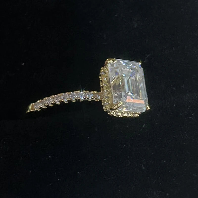 A dazzling lady's 1/2/3/4 carat moissanite engagement ring with an exquisite octagonal design, made of 925 silver plated with 18