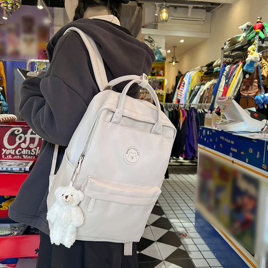 Stylish Teens School Backpack Large Capacity with Plush Pendant for Travel Camping Sports and Work