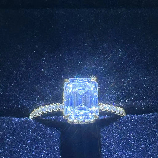 A dazzling lady's 1/2/3/4 carat moissanite engagement ring with an exquisite octagonal design, made of 925 silver plated with 18