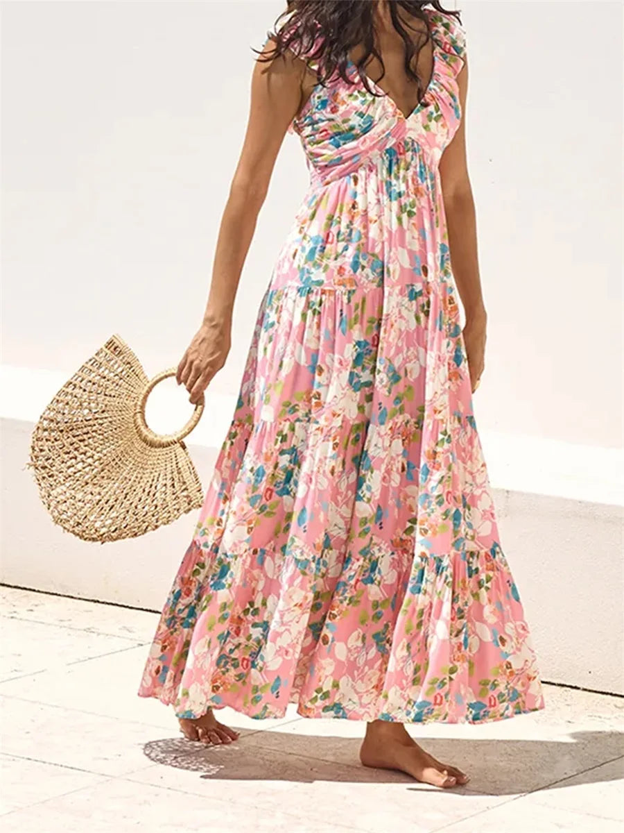 Elegant Sleeveless Maxi Dress with Boho Floral Print and Ruffled Hemline Perfect for Summer Beach Parties and Events