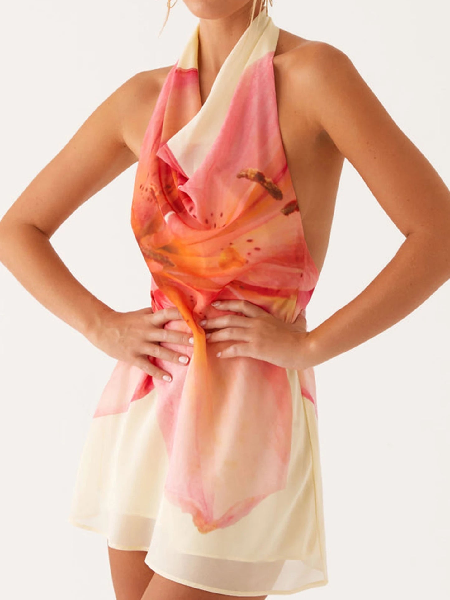 Elegant Floral Print Sleeveless Halter Neck Mini Dress for Women Perfect for Summer Parties Clubbing and Vacations