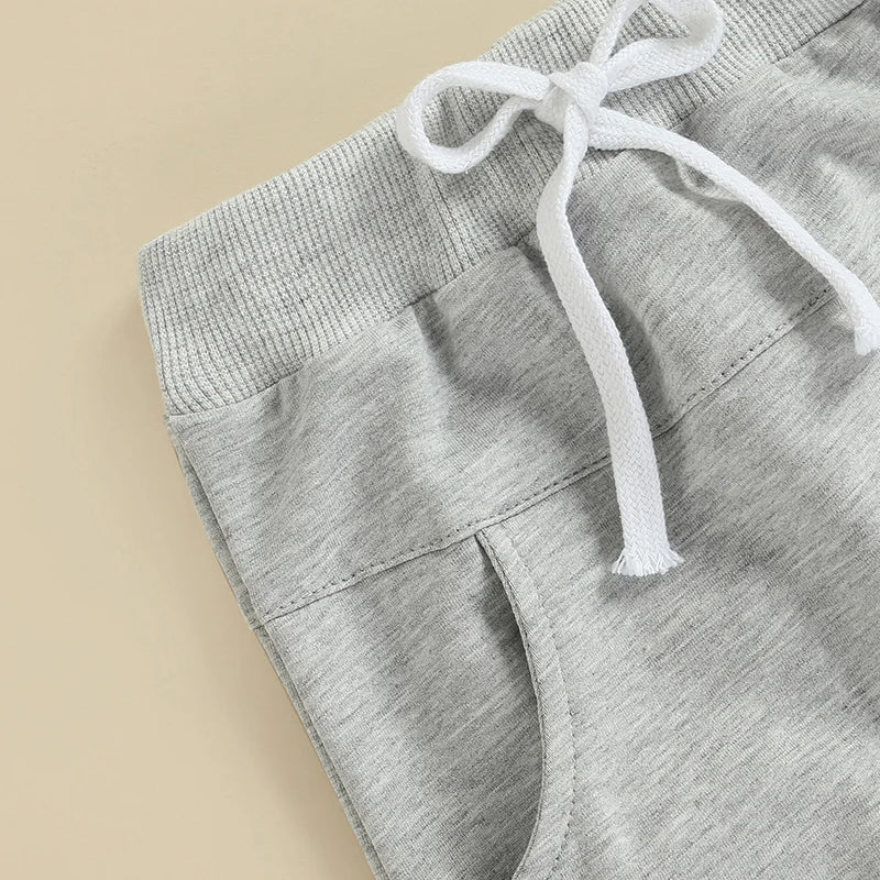 Boys 2-Piece Set with Short Sleeve Letter Print T-Shirt and Solid Color Long Pants Round Neck Tee and Trouser Outfit